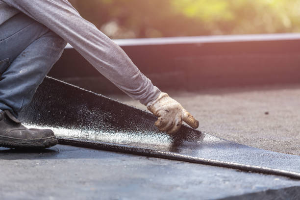 Professional Basement Waterproofing technician working in Peachtree Corners, GA